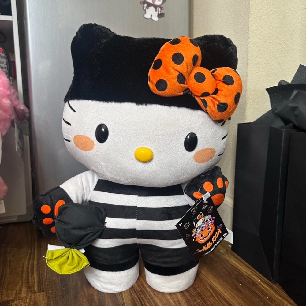 Hello Kitty Black and White Striped Stuffed Animal with Orange Bow